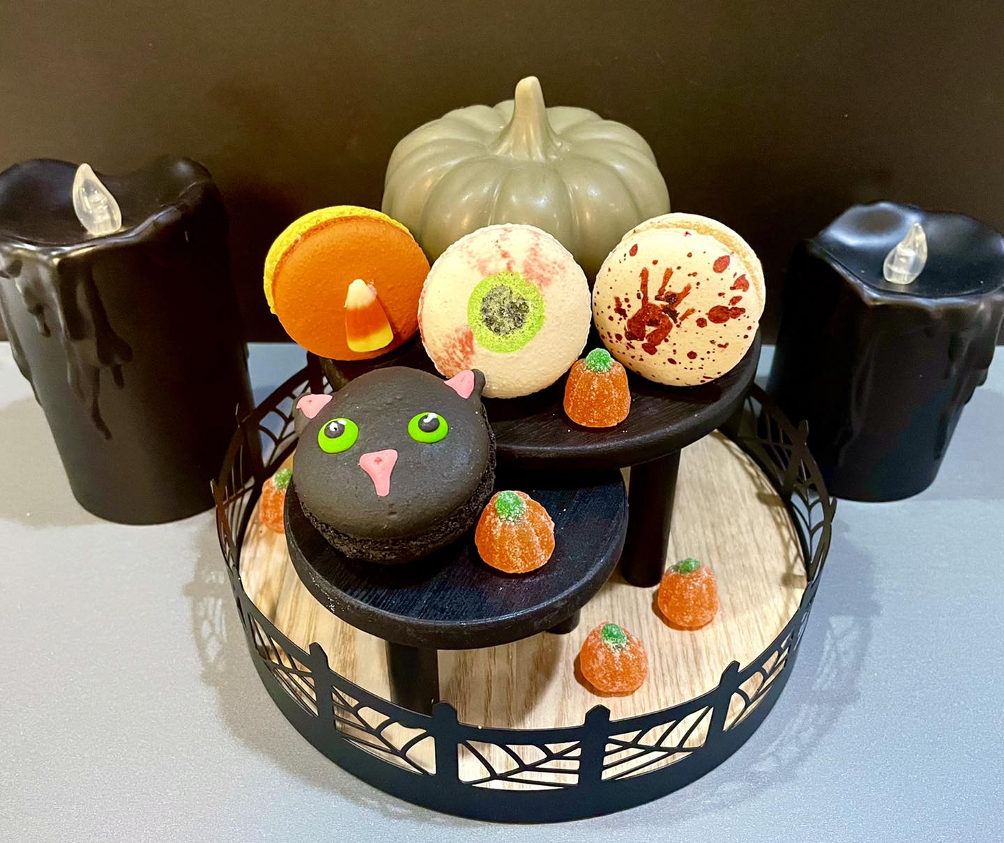 An assortment of Halloween-themed macarons